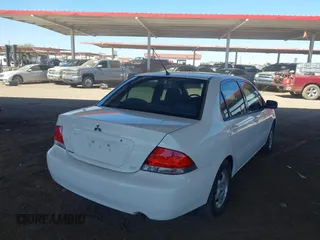 2004 Mitsubishi Lancer ES with VIN JA3AJ26E14U065498, listed as a IAAI auction lot 41887945 with 142,632 mi miles. Bid and sale history available at carsss.com. Image 4.