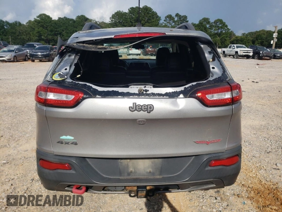 2016 Jeep Cherokee Trailhawk z VIN 1C4PJMBSXGW121272, wystawiony jako Copart lot #61769505 z przebiegiem 119 353 mil mil oraz Szkoda całkowita • Salvage title. Historia ofert i sprzedaży dostępna na DreamBid. Obrazek 6.