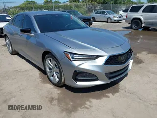 2021 Acura TLX Technology z VIN 19UUB5F4XMA009079, wystawiony jako IAAI lot #42055352 z przebiegiem 67 765 mil mil oraz . Historia ofert i sprzedaży dostępna na DreamBid. Obrazek 1.
