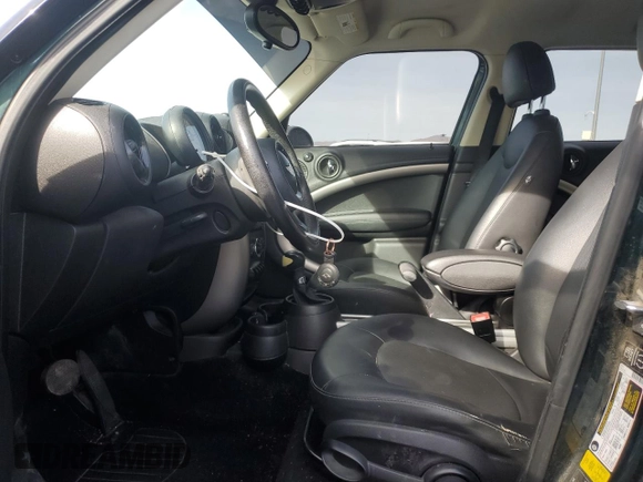 2013 MINI Countryman with VIN WMWZB3C54DWM09421, listed as a Copart auction lot 85136324 with 110,615 mi miles and Salvage title. Bid and sale history available at DreamBid. Image 7.