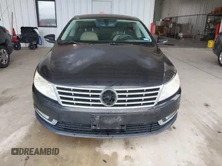 2013 Volkswagen CC Sport with VIN WVWBP7AN1DE506856, listed as a IAAI auction lot 42111392 with 172,706 mi miles. Bid and sale history available at carsss.com. Image 6.
