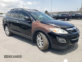 2012 Mazda CX-9 Grand Touring with VIN JM3TB2DA4C0361023, listed as a Copart auction lot 63839005 with 140,784 mi miles and Salvage title. Bid and sale history available at DreamBid. Image 4.