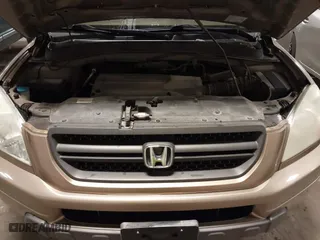2004 Honda Pilot EX with VIN 2HKYF18464H567384, listed as a IAAI auction lot 41790773 with 142,534 mi miles. Bid and sale history available at carsss.com. Image 10.