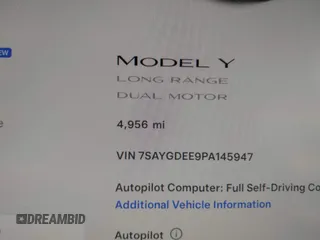 2023 Tesla Model Y Long Range with VIN 7SAYGDEE9PA145947, listed as a IAAI auction lot 42131783 with 4,956 mi miles and . Bid and sale history available at DreamBid. Image 16.