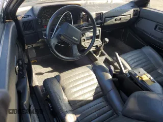 1986 Toyota Supra z VIN JT2MA67L9G0175108, wystawiony jako Copart lot #80793984 z przebiegiem 158 959 mil mil oraz Szkoda całkowita • Salvage title. Historia ofert i sprzedaży dostępna na DreamBid. Obrazek 8.