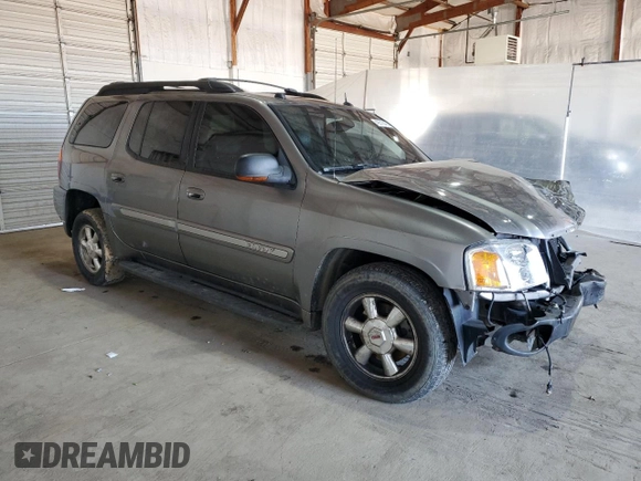 2004 GMC Envoy SLT with VIN 1GKET16S146222288, listed as a Copart auction lot 49316405 with 210,424 mi miles and Salvage Title. Bid and sale history available at DreamBid. Image 4.