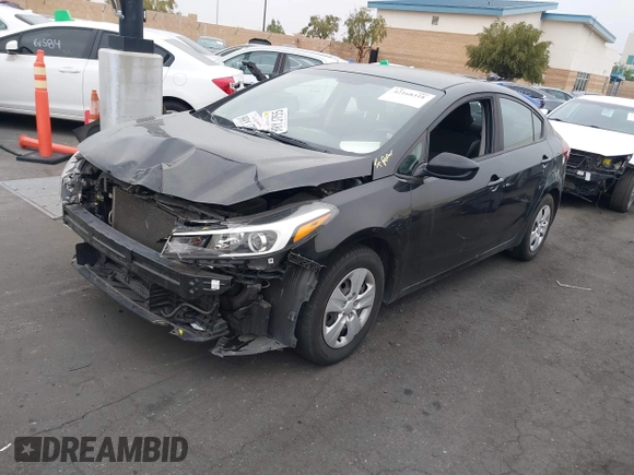 2017 Kia Forte LX with VIN 3KPFK4A77HE135311, listed as a IAAI auction lot 42168318 with 165,249 mi miles and . Bid and sale history available at carsss.com. Image 2.