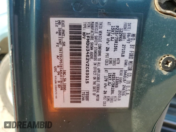 1997 Ford Explorer XL with VIN 1FMDU34E2VZC03015, listed as a Copart auction lot 80654764 with 295,587 mi miles and Salvage title. Bid and sale history available at DreamBid. Image 12.
