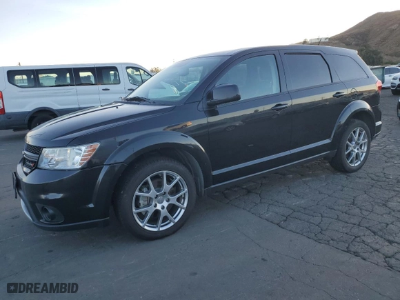 2013 Dodge Journey GT with VIN 3C4PDDEG5DT612459, listed as a Copart auction lot 85282824 with 144,251 mi miles and Clean Title. Bid and sale history available at carsss.com. Image 1.