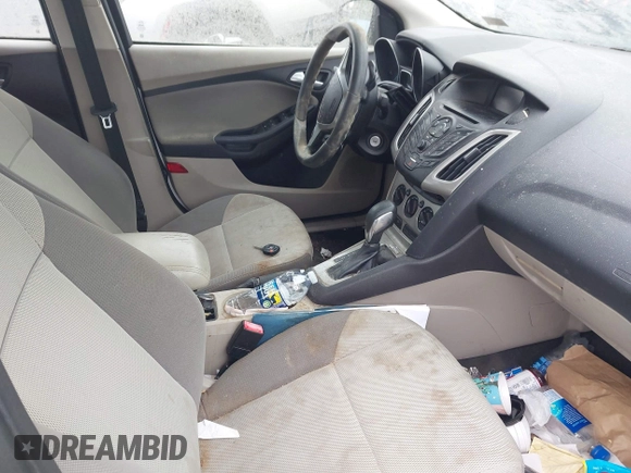 2013 Ford Focus SE z VIN 1FADP3F20DL302583, wystawiony jako IAAI lot #42332079 z przebiegiem 149 535 mil mil oraz . Historia ofert i sprzedaży dostępna na DreamBid. Obrazek 5.