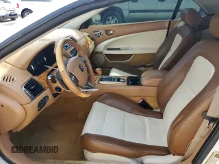 2007 Jaguar XK with VIN SAJDA44B775B05606, listed as a Copart auction lot 49419515 with 115,607 mi miles and Salvage Title. Bid and sale history available at DreamBid. Image 7.