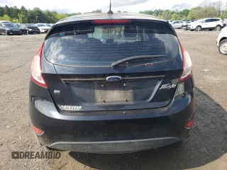 2016 Ford Fiesta SE z VIN 3FADP4EJ3GM155158, wystawiony jako Copart lot #55883465 z przebiegiem 116 184 mil mil oraz Czysty tytuł • Clean title. Historia ofert i sprzedaży dostępna na DreamBid. Obrazek 6.