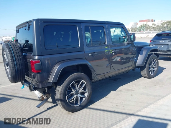 2024 Jeep Wrangler Sport S with VIN 1C4RJXN61RW192386, listed as a IAAI auction lot 42001810 with 7,426 mi miles and . Bid and sale history available at DreamBid. Image 4.