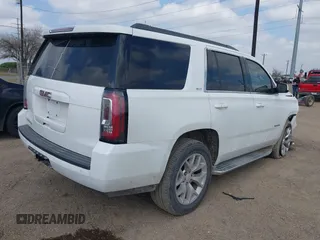 2015 GMC Yukon SLT with VIN 1GKS1BKC6FR109970, listed as a IAAI auction lot 41507467 with 115,309 mi miles. Bid and sale history available at carsss.com. Image 4.