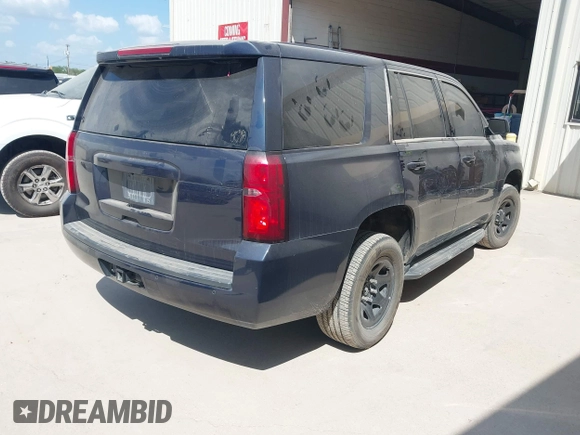 2017 Chevrolet Tahoe Commercial with VIN 1GNLCDEC4HR310570, listed as a IAAI auction lot 42416737 with 92,000 mi miles and . Bid and sale history available at DreamBid. Image 4.