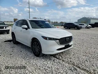 2024 Mazda CX-5 2.5 Turbo Signature with VIN JM3KFBXY7R0518304, listed as a Copart auction lot 42788985 with 8,593 mi miles and Salvage Title. Bid and sale history available at carsss.com. Image 11.