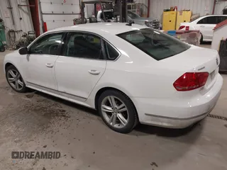 2014 Volkswagen Passat SEL Premium with VIN 1VWCS7A36EC057394, listed as a IAAI auction lot 41254293 with 134,715 mi miles. Bid and sale history available at carsss.com. Image 3.