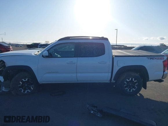 2017 Toyota Tacoma SR5 z VIN 3TMCZ5AN9HM061737, wystawiony jako IAAI lot #41959420 z przebiegiem 86 395 mil mil oraz . Historia ofert i sprzedaży dostępna na DreamBid. Obrazek 14.
