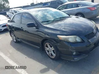 2009 Toyota Corolla XRS with VIN 1NXBE40EX9Z100623, listed as a IAAI auction lot 42032138 with 183,901 mi miles. Bid and sale history available at carsss.com. Image 1.