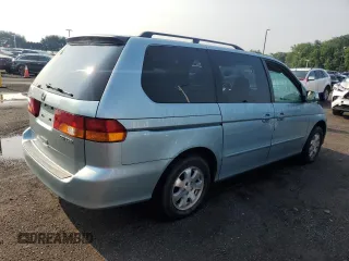 2003 Honda Odyssey EX-L с VIN 2HKRL18033H501741, выставлен на аукционе Copart как лот 60496865 с пробегом Не указан миль и Списание • Salvage title. История ставок и продаж доступна на DreamBid. Изображение 3.
