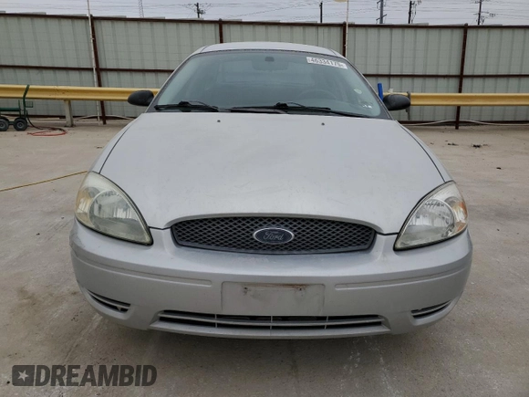 2004 Ford Taurus z VIN 1FAFP52224A203303, wystawiony jako Copart lot #46334175 z przebiegiem 158 832 mil mil oraz Szkody całkowita. Historia ofert i sprzedaży dostępna na DreamBid. Obrazek 5.