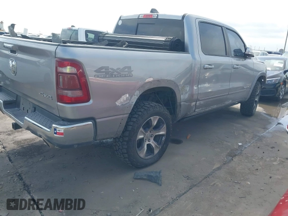 2019 Ram 1500 Laramie with VIN 1C6SRFJT8KN686506, listed as a IAAI auction lot 42499382 with 145,287 mi miles and . Bid and sale history available at DreamBid. Image 4.