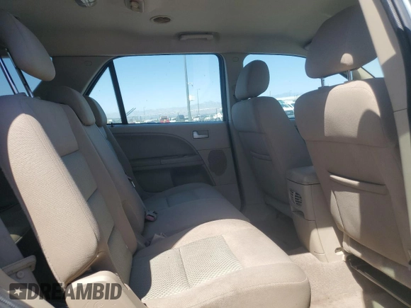 2006 Ford Freestyle SE z VIN 1FMZK01126GA50998, wystawiony jako Copart lot #58697065 z przebiegiem 203 698 mil mil oraz Czysty tytuł • Clean title. Historia ofert i sprzedaży dostępna na DreamBid. Obrazek 11.