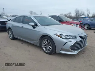 2021 Toyota Avalon XLE z VIN 4T1JZ1FB8MU056223, wystawiony jako IAAI lot #41374231 z przebiegiem 73 357 mil mil oraz . Historia ofert i sprzedaży dostępna na DreamBid. Obrazek 1.
