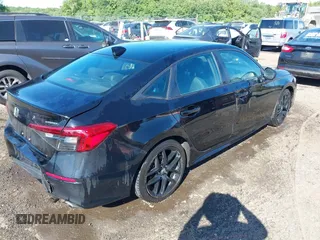 2023 Honda Civic Sport with VIN 2HGFE2F56PH509382, listed as a IAAI auction lot 42296205 with 125,584 mi miles and . Bid and sale history available at DreamBid. Image 4.