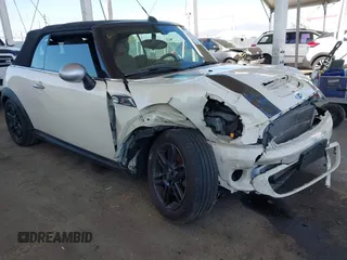 2014 MINI Convertible S with VIN WMWZP3C5XET706911, listed as a IAAI auction lot 42217410 with 54,649 mi miles and . Bid and sale history available at DreamBid. Image 1.
