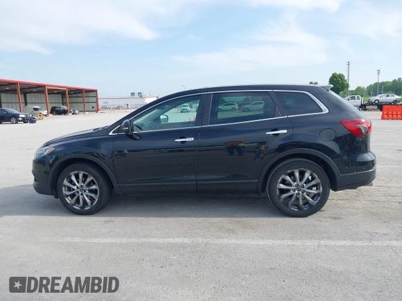 2015 Mazda CX-9 Grand Touring z VIN JM3TB2DA1F0456773, wystawiony jako IAAI lot #42257555 z przebiegiem 152 890 mil mil oraz . Historia ofert i sprzedaży dostępna na DreamBid. Obrazek 14.