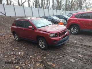 2016 Jeep Compass High Altitude Edition with VIN 1C4NJDEB0GD779584, listed as a IAAI auction lot 41209135 with 143,624 mi miles. Bid and sale history available at carsss.com. Image 1.