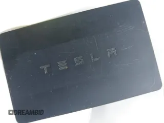 2019 Tesla Model 3 Mid Range with VIN 5YJ3E1EA2KF305834, listed as a IAAI auction lot 41719610 with 126,333 mi miles and . Bid and sale history available at DreamBid. Image 11.