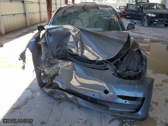 2022 Tesla Model 3 with VIN 5YJ3E1EA4NF285493, listed as a Copart auction lot 49793005 with 84,563 mi miles and Non Repairable. Bid and sale history available at carsss.com. Image 5.