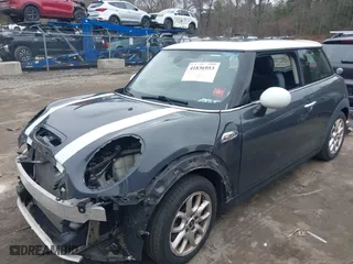 2015 MINI Cooper Hardtop S with VIN WMWXP7C54F2A41531, listed as a IAAI auction lot 41836953 with 77,545 mi miles. Bid and sale history available at carsss.com. Image 18.