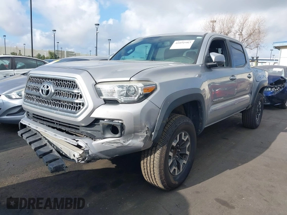 2017 Toyota Tacoma SR5 with VIN 3TMAZ5CN4HM050262, listed as a IAAI auction lot 41891983 with 140,692 mi miles and . Bid and sale history available at DreamBid. Image 2.