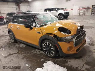 2016 MINI Cooper Hardtop S with VIN WMWXP7C51G2C61145, listed as a IAAI auction lot 40966675 with 70,077 mi miles. Bid and sale history available at carsss.com. Image 1.