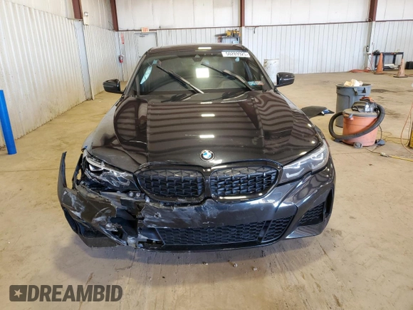 2022 BMW 3 Series M340i xDrive with VIN 3MW5U9J06N8C77498, listed as a Copart auction lot 50289925 with 39,537 mi miles and Salvage Title. Bid and sale history available at carsss.com. Image 5.
