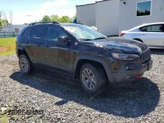 2022 Jeep Cherokee Trailhawk with VIN 1C4PJMBX8ND543366, listed as a Copart auction lot 55805195 with 61,926 mi miles and Salvage title. Bid and sale history available at DreamBid. Image 4.