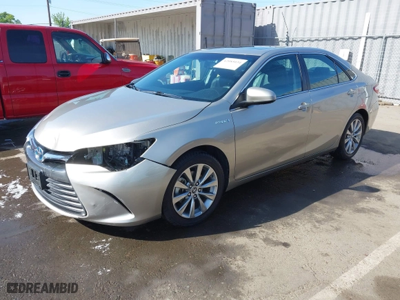 2015 Toyota Camry Hybrid LE with VIN 4T1BD1FK1FU174975, listed as a IAAI auction lot 42085034 with 54,728 mi miles. Bid and sale history available at carsss.com. Image 18.