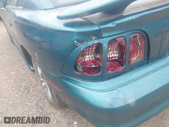 1996 Ford Mustang z VIN 1FALP4044TF226536, wystawiony jako IAAI lot #42468299 z przebiegiem 164 396 mil mil oraz . Historia ofert i sprzedaży dostępna na DreamBid. Obrazek 6.