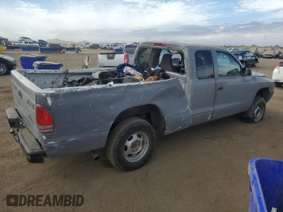 2001 Dodge Dakota SLT with VIN 1B7GG22X21S182371, listed as a Copart auction lot 76330064 with 140,917 mi miles and Non Repairable. Bid and sale history available at DreamBid. Image 3.