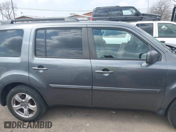 2012 Honda Pilot EX-L with VIN 5FNYF4H53CB026381, listed as a IAAI auction lot 41802360 with 165,425 mi miles and . Bid and sale history available at DreamBid. Image 13.
