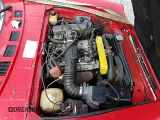 1980 FIAT 124 Spider z VIN 124CS000173621, wystawiony jako Copart lot #47671670 z przebiegiem 86 731 mil mil oraz Szkoda całkowita • Salvage title. Historia ofert i sprzedaży dostępna na DreamBid. Obrazek 7.