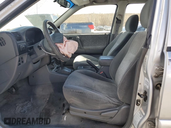 2000 Isuzu Rodeo z VIN 4S2DM58W8Y4331154, wystawiony jako Copart lot #49507535 z przebiegiem 198 476 mil mil oraz Szkody całkowita. Historia ofert i sprzedaży dostępna na DreamBid. Obrazek 7.