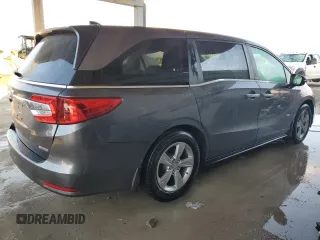 2019 Honda Odyssey EX-L with VIN 5FNRL6H71KB126181, listed as a Copart auction lot 77083064 with 48,590 mi miles and Salvage Title. Bid and sale history available at DreamBid. Image 3.