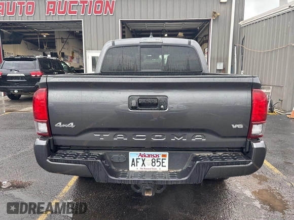 2021 Toyota Tacoma SR z VIN 5TFCZ5AN2MX279975, wystawiony jako IAAI lot #42477503 z przebiegiem 50 690 mil mil oraz . Historia ofert i sprzedaży dostępna na DreamBid. Obrazek 29.