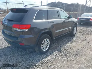 2015 Jeep Grand Cherokee Altitude with VIN 1C4RJFAG9FC796385, listed as a IAAI auction lot 41849193 with 111,739 mi miles. Bid and sale history available at carsss.com. Image 4.