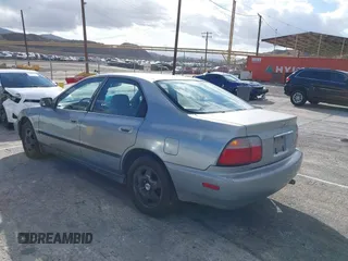 1996 Honda Accord LX with VIN 1HGCD5634TA291036, listed as a IAAI auction lot 41583543 with 166,725 mi miles and . Bid and sale history available at carsss.com. Image 3.