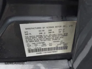 2005 Nissan Altima 3.5 SE with VIN 1N4BL11D75N478987, listed as a IAAI auction lot 41129015 with 123,746 mi miles. Bid and sale history available at carsss.com. Image 9.